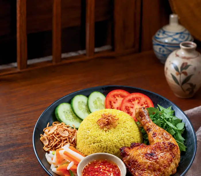 18. Cơm đùi gà · Reis mit Hähnchenkeule